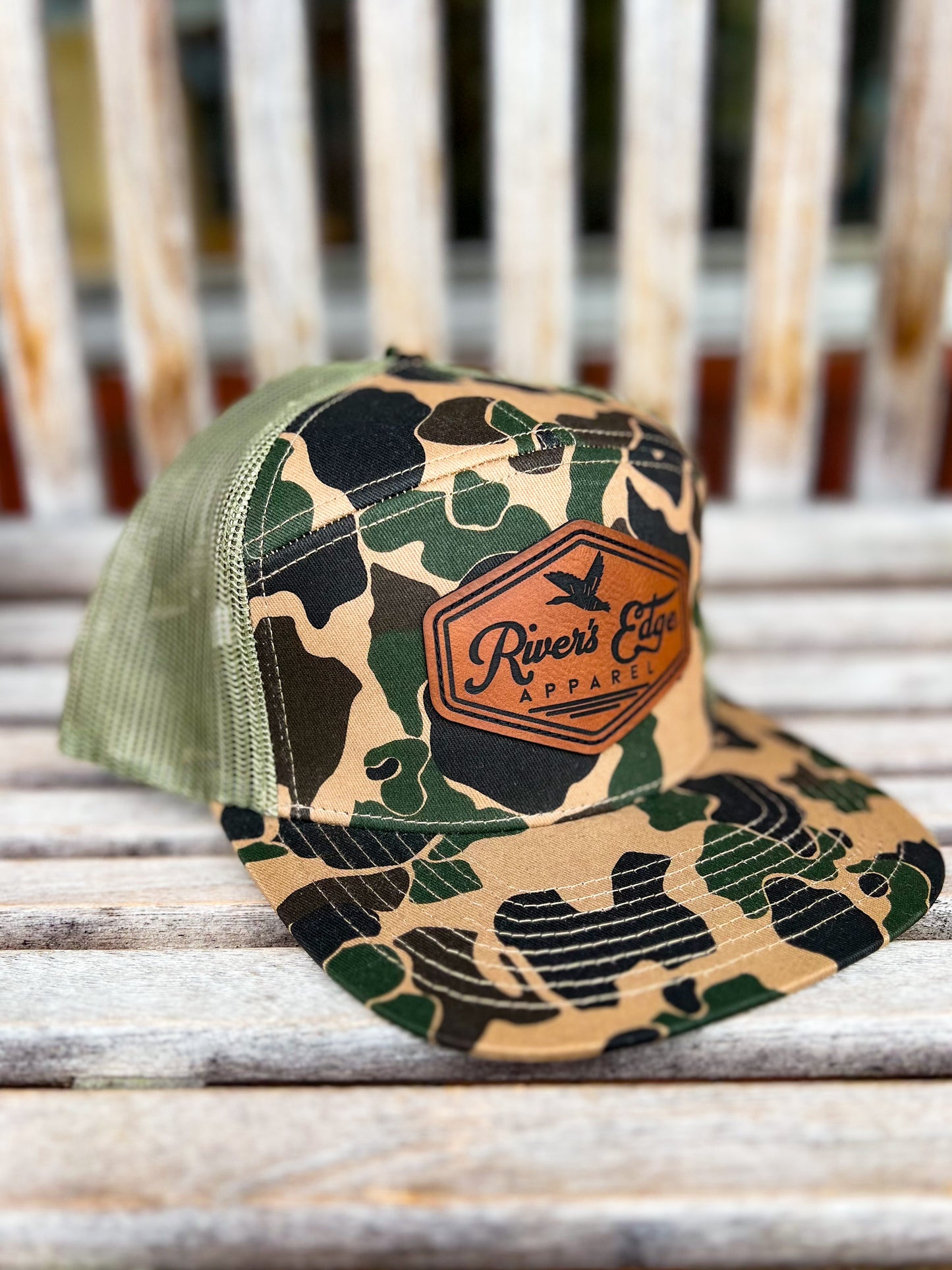 7 Panel River’s Edge Apparel Trucker Hat with Leather Patch - Old School Camo