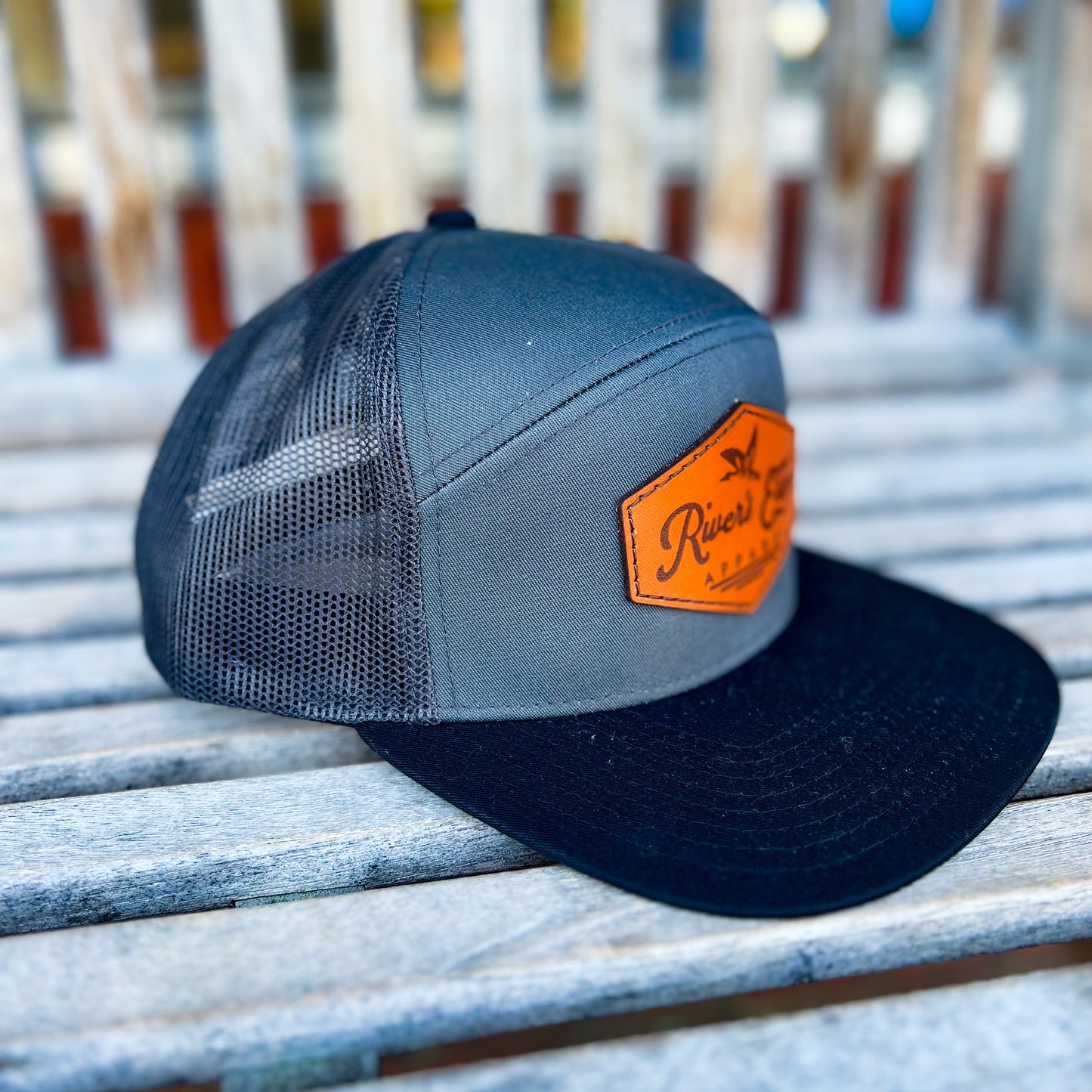 7 Panel River’s Edge Apparel Trucker Hat with Leather Patch - Charcoal/Black